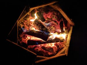 camp fire with glowing ambers