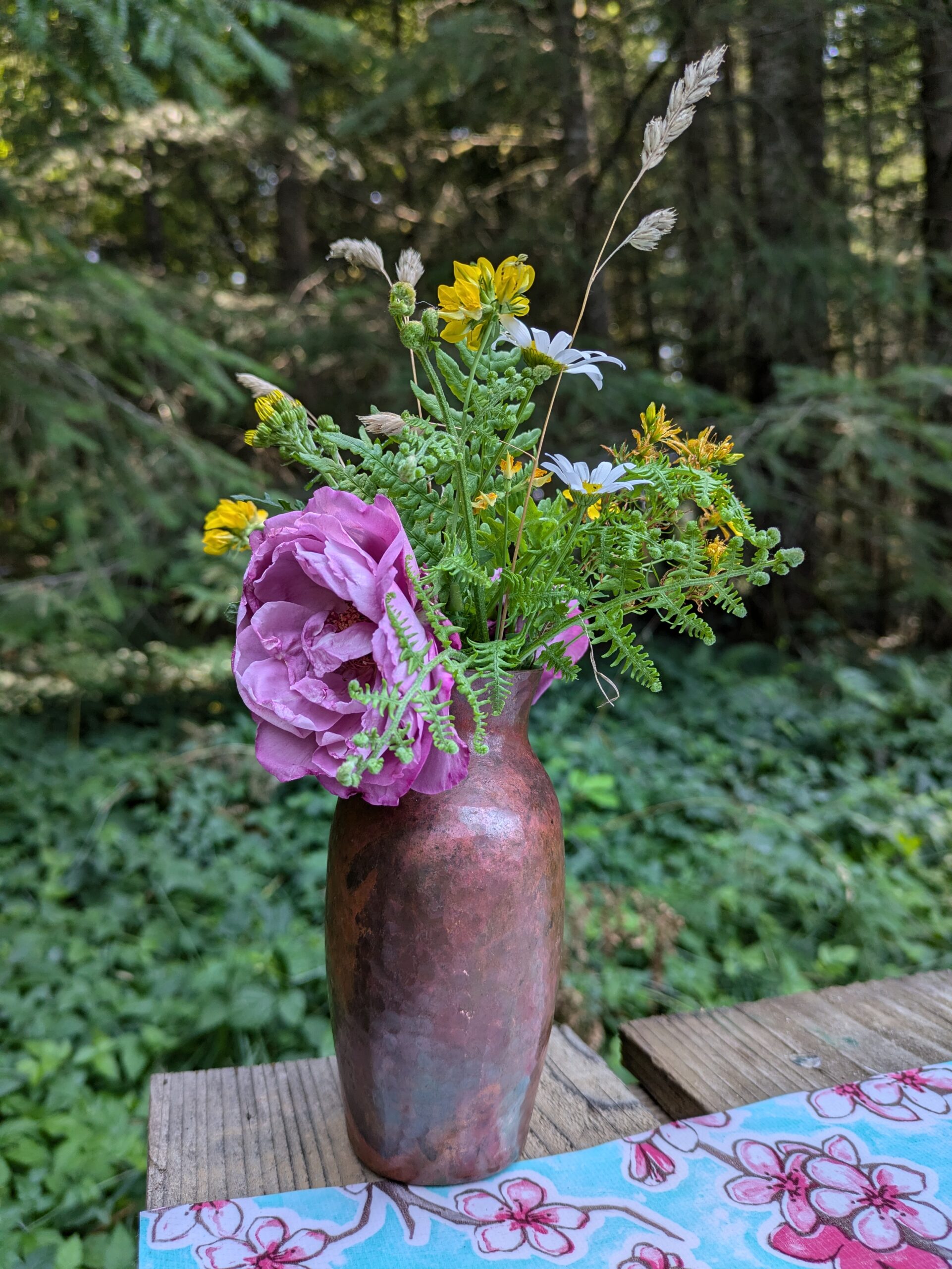 PXL_20240810_213825788 pink and yellow flowers and ferns in vase